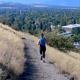 Stephanie Meyers running on Mount Sentinel